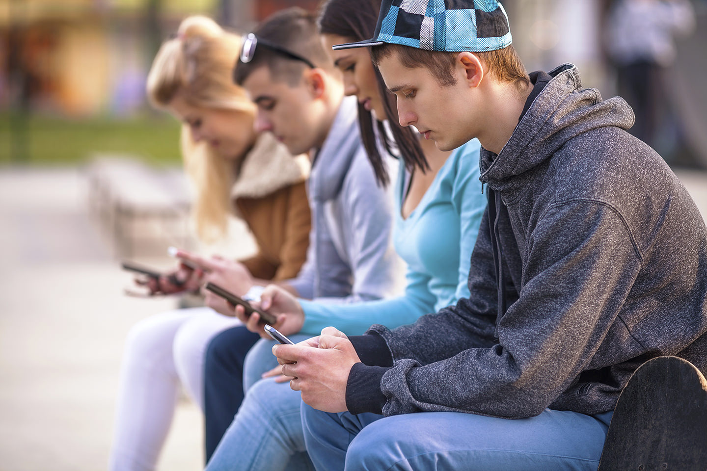 Teen Screen Activities Linked to Less Happiness — No Exceptions