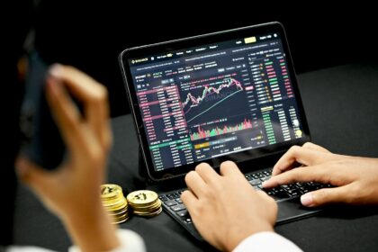 person using black tablet computer