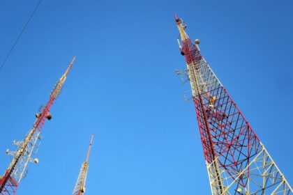 a group of red and yellow roller coasters