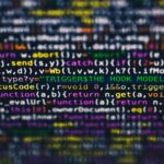 Vibrant close-up of multicolor programming code lines displayed on a screen.