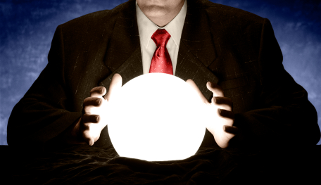 Businessman Consulting Glowing Crystal Ball Crystal ball graphic