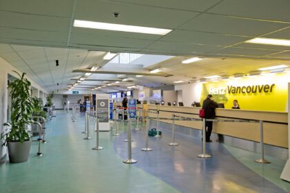A Hertz car rental counter at Vancouver International Airport