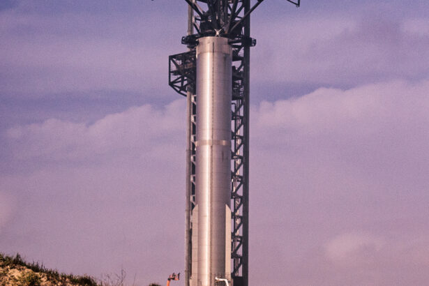 A SpaceX Super Heavy booster on the launch tower at Starbase, Texas
